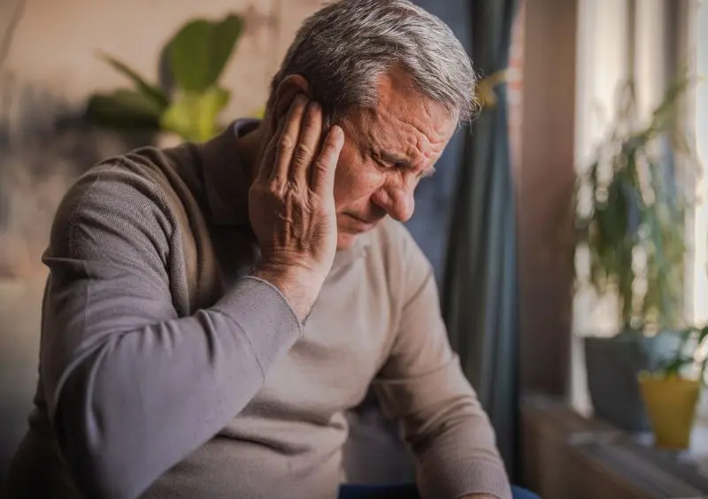 Tinnitus severity influences the pace of hearing restoration